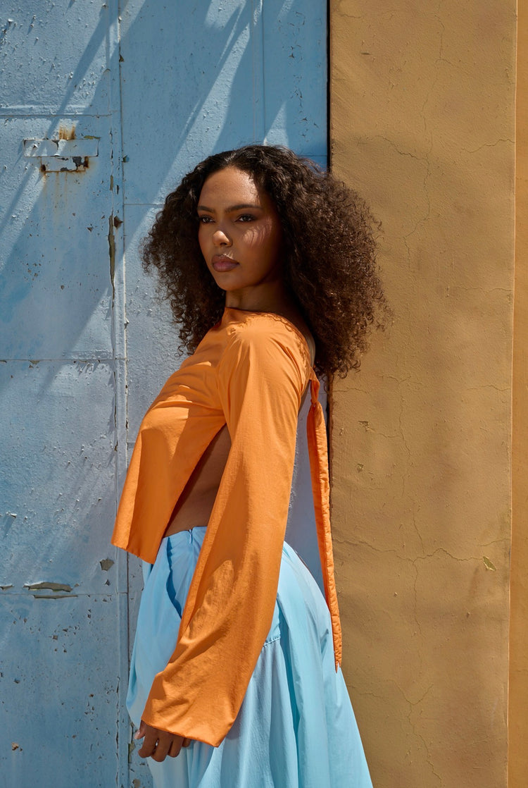 WINDBREAKER OPEN BACK BLOUSE // PERSIMMON